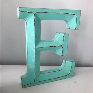 large wooden letter